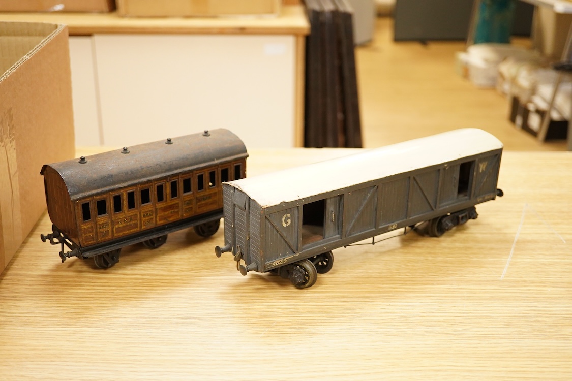 Nine 0 gauge railway coarse scale GWR and private owner freight wagons, mainly of wooden construction, together with a Bing GNR 6-wheel suburban coach (10)